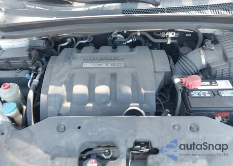 2010 Honda Odyssey Ex z USA, uszkodzony, nr VIN 5FNRL3H49AB051927